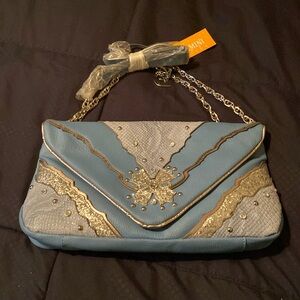 Gemini Rising purse new with tag
